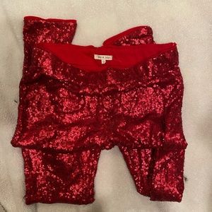 Large red sequin leggings